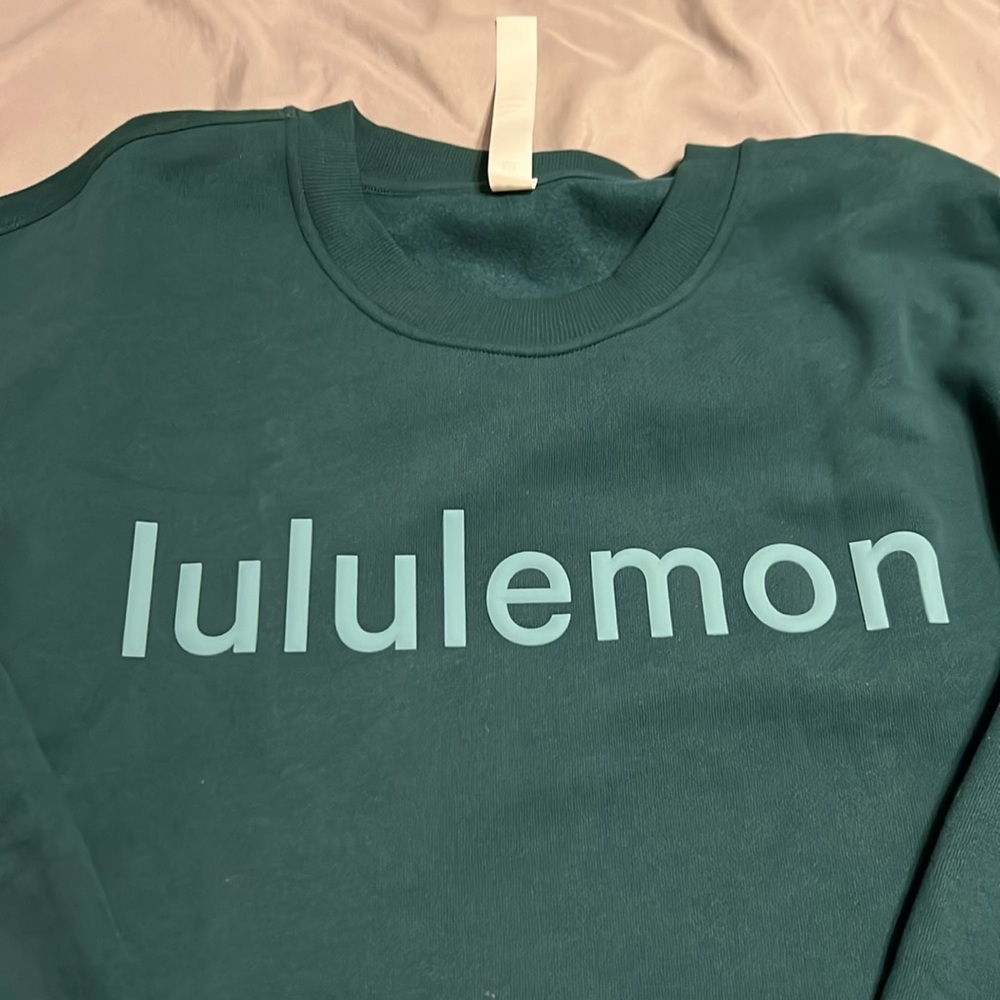 Brand new!! Never worn gorgeous teal green warm sweatshirt